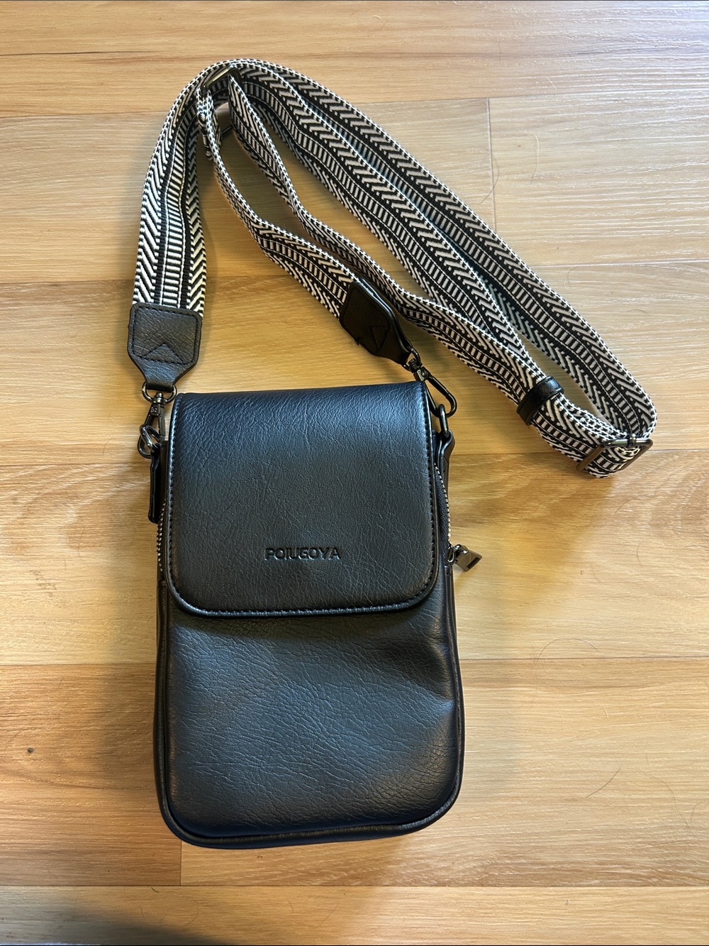 Black Leatherette Crossbody Messenger with Patterned Strap